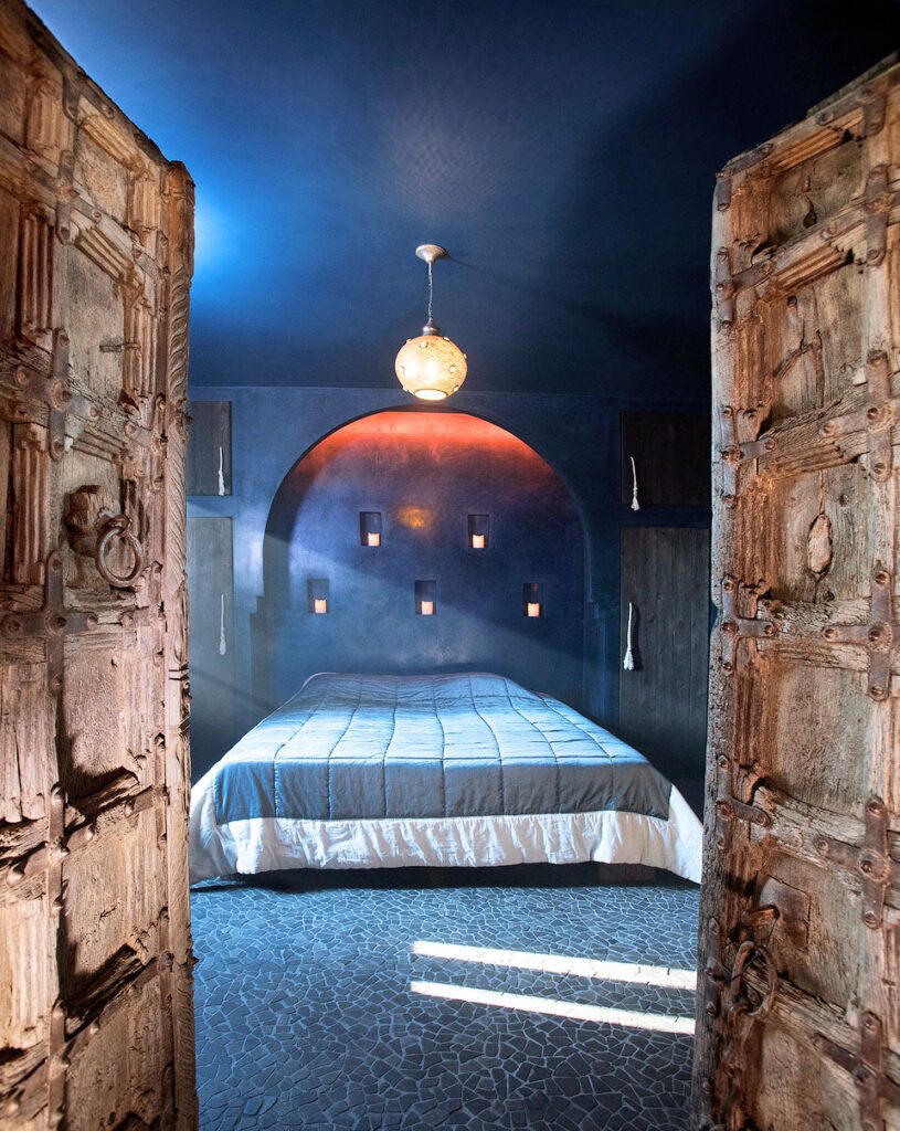 Tête de lit et bougie à Hoeve La Cascina à Gand