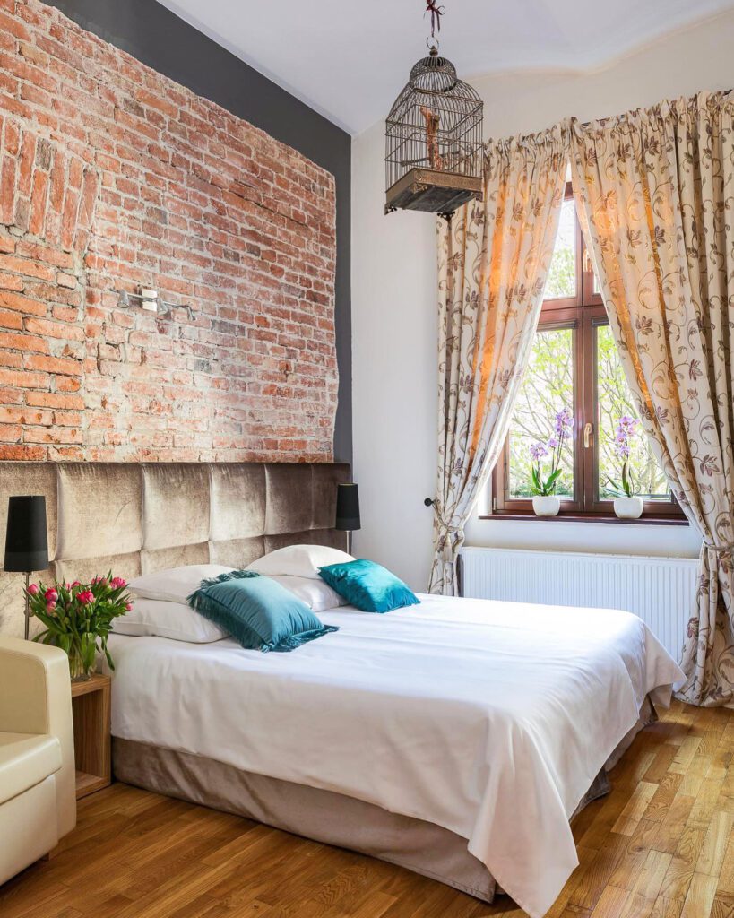 Chambre avec mur de pierres à Cracowdays à Cracovie